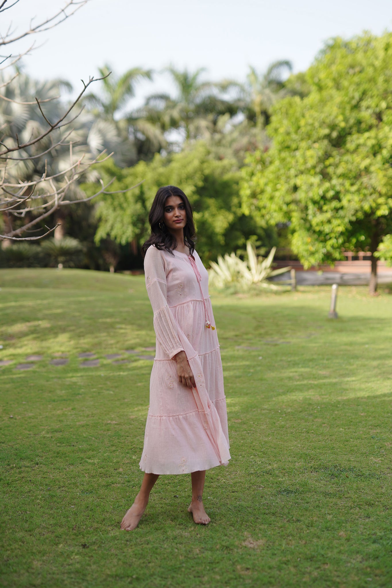Light Pink Cotton Crush Tiered Midi Dress With Floral Embroidery Details.