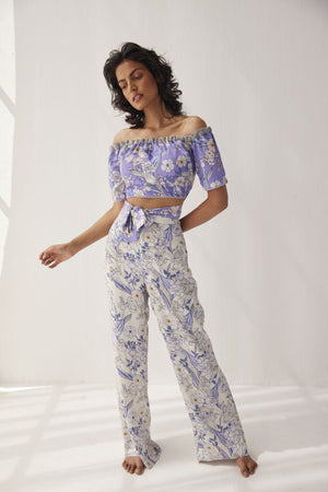 Very Peri Off Shoulder Top paired with pants